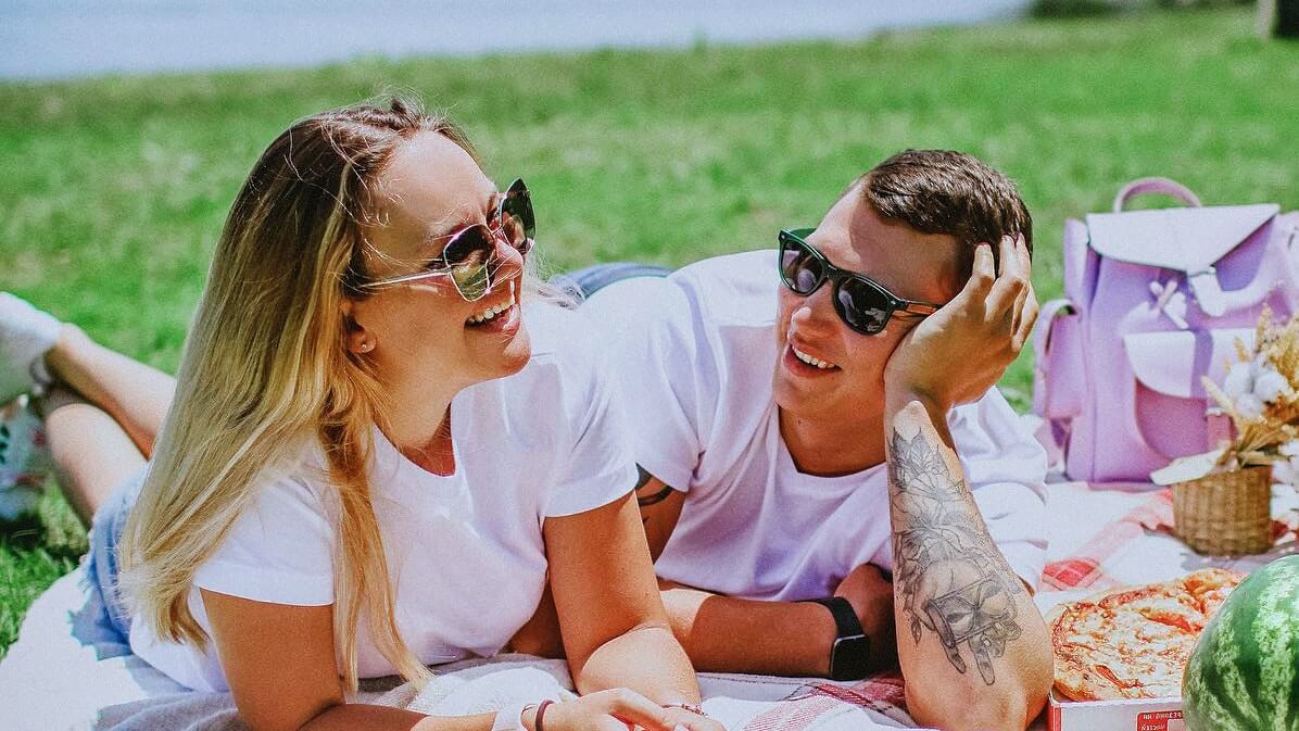 Couple enjoying a picnic.