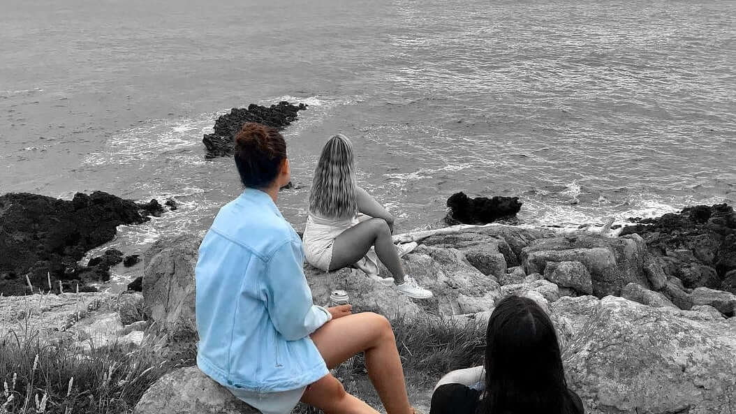 Group of ladies enjoying the ocean view.